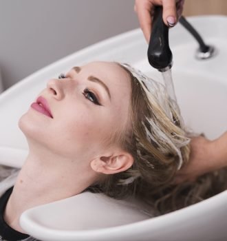 blonde-woman-getting-her-hair-washed